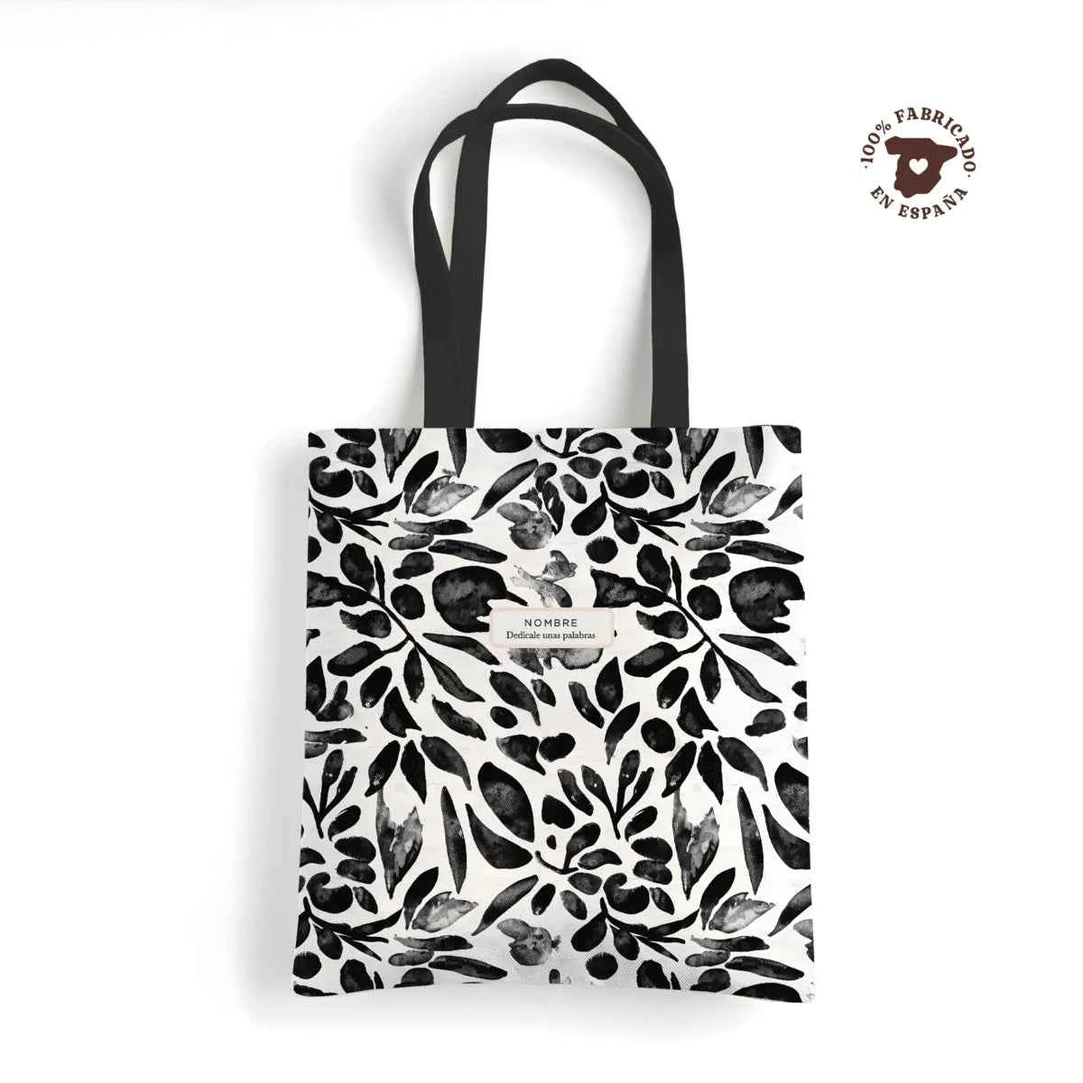 Tote bag resistente fabricada en España con estampado Floral Negro, elegante y moderna. Personalizable con nombre.