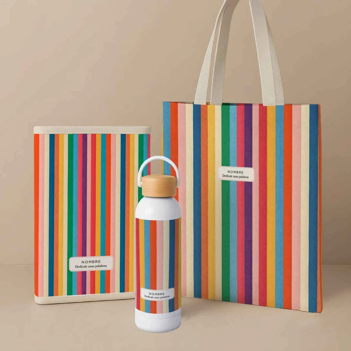 Pack con tote bag, portadocumentos y bidón en estampado Carnivale de rayas multicolor. Fabricado en España y personalizable.