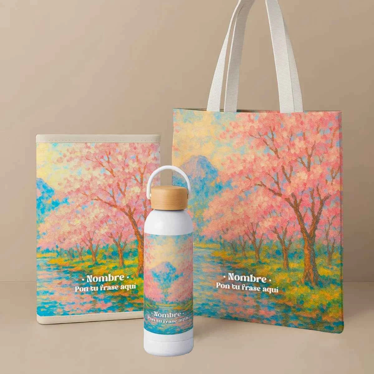 Pack con tote bag, portadocumentos acolchado y bidón térmico en estampado Cerezos, tonos pastel rosa y azul. Fabricado en España y personalizable.