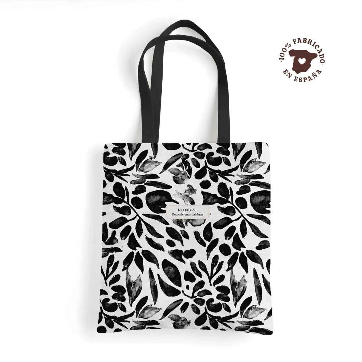 Tote bag de loneta fabricada 100% en España con estampado floral Flores Negras en tonos negro y gris acuarela, personalizada con nombre.