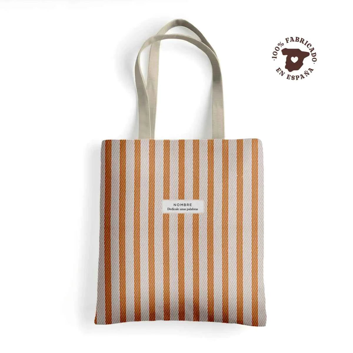 Tote bag de loneta con estampado de rayas Mocatriz en tonos crema y marrón caramelo, personalizada con nombre. Fabricado en España